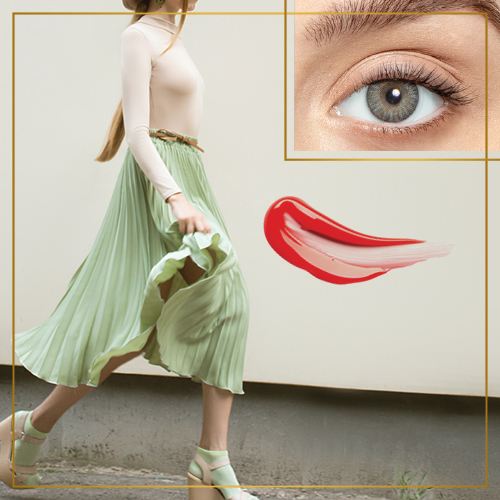 Woman wearing pistachio color skirt with Gray Air Optix color contact lens